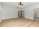 Spacious bedroom featuring hardwood floors and access to bathroom at 419 Sylvania Ave, Charlotte, NC 28206