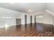 Spacious bonus room with hardwood floors and multiple closets at 419 Sylvania Ave, Charlotte, NC 28206