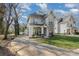 Two story craftsman style home with a front yard at 419 Sylvania Ave, Charlotte, NC 28206