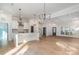 Modern kitchen with white cabinets, marble countertops, and island at 419 Sylvania Ave, Charlotte, NC 28206