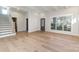 Bright living room with hardwood floors, high ceilings, and large windows at 419 Sylvania Ave, Charlotte, NC 28206