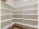 Spacious pantry with ample shelving for food storage at 419 Sylvania Ave, Charlotte, NC 28206