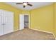 Spacious bedroom with double doors and neutral colored walls at 711 Torrey Pines Ln, Fort Mill, SC 29715