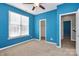 Bedroom with teal walls, ceiling fan and carpet at 711 Torrey Pines Ln, Fort Mill, SC 29715