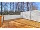 Wooden deck with white vinyl fence and view of backyard at 711 Torrey Pines Ln, Fort Mill, SC 29715