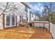 Spacious deck with wooden planks and cable railing overlooking backyard at 711 Torrey Pines Ln, Fort Mill, SC 29715