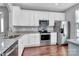 Modern kitchen with stainless steel appliances and granite countertops at 711 Torrey Pines Ln, Fort Mill, SC 29715