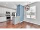 Kitchen with island and breakfast bar, hardwood floors at 711 Torrey Pines Ln, Fort Mill, SC 29715