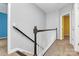 Upper hallway with carpeted floors and a stylish staircase at 711 Torrey Pines Ln, Fort Mill, SC 29715