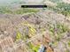 Aerial view of 2.19-acre wooded lot with a home site at 911 Wildwood Dr, Kings Mountain, NC 28086