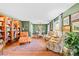 Spacious living room features hardwood floors, a large rug, comfortable seating, and a view into the kitchen at 911 Wildwood Dr, Kings Mountain, NC 28086