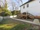 Backyard with wooden deck, grilling area, and grassy space at 1019 Trembeth Dr, Charlotte, NC 28205