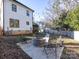 Backyard fire pit with seating area and pathway at 1019 Trembeth Dr, Charlotte, NC 28205