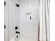 Clean bathroom with white subway tile shower and bathtub at 1019 Trembeth Dr, Charlotte, NC 28205