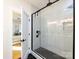 Modern bathroom with frameless shower and hexagon tile floor at 1019 Trembeth Dr, Charlotte, NC 28205