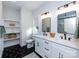 Modern bathroom with double vanity, hexagon tile floor, and walk-in shower at 1019 Trembeth Dr, Charlotte, NC 28205