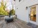 Deck with wicker furniture and view of backyard at 1019 Trembeth Dr, Charlotte, NC 28205