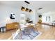 Bright dining area with hardwood floors and a view of the kitchen and living areas at 1019 Trembeth Dr, Charlotte, NC 28205