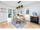 Modern dining room with light hardwood floors and a light wood dining table at 1019 Trembeth Dr, Charlotte, NC 28205