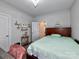 Charming bedroom with a bed and built-in shelving at 11307 Miller Rd # 101, Pineville, NC 28134