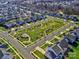 Aerial view of a neighborhood with homes and green spaces at 11307 Miller Rd # 101, Pineville, NC 28134