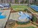 Community pool with a separate splash pad at 11307 Miller Rd # 101, Pineville, NC 28134