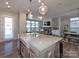 Bright kitchen with a farmhouse sink and view of backyard at 11307 Miller Rd # 101, Pineville, NC 28134