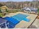 Community lap pool with adjacent clubhouse at 11307 Miller Rd # 101, Pineville, NC 28134