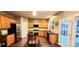 Kitchen with wood cabinets, granite counters, and stainless steel appliances at 14021 Eldon Dr, Charlotte, NC 28277