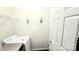 Laundry room with washer, dryer, and shelving at 14021 Eldon Dr, Charlotte, NC 28277