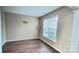 Bright office with hardwood floors and large window at 14021 Eldon Dr, Charlotte, NC 28277