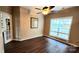 Office with hardwood floors, ceiling fan, and French doors at 14021 Eldon Dr, Charlotte, NC 28277