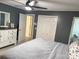 Main bedroom with gray walls, ample closet space, and access to bathroom at 1432 Poston Dr, Lincolnton, NC 28092