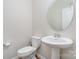 Simple bathroom with pedestal sink and updated fixtures at 1878 Sapphire Meadow Dr, Fort Mill, SC 29715