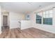 Bright bedroom with hardwood floors and a window at 1878 Sapphire Meadow Dr, Fort Mill, SC 29715