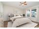 Serene bedroom with a queen-size bed, neutral tones and natural light at 1878 Sapphire Meadow Dr, Fort Mill, SC 29715