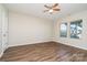 Spacious bedroom with wood-look floors and ceiling fan at 1878 Sapphire Meadow Dr, Fort Mill, SC 29715