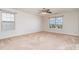 Bedroom with wood-look accent wall and neutral carpeting at 1878 Sapphire Meadow Dr, Fort Mill, SC 29715