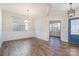 Bright dining room with hardwood floors, chandelier, and wainscoting at 1878 Sapphire Meadow Dr, Fort Mill, SC 29715