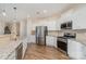 Modern kitchen with stainless steel appliances and granite countertops at 1878 Sapphire Meadow Dr, Fort Mill, SC 29715