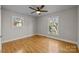 Bright bedroom with hardwood floors and ceiling fan at 2008 Townsend Ave, Charlotte, NC 28205