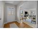 Bright entryway leading to a living room with hardwood floors at 2008 Townsend Ave, Charlotte, NC 28205