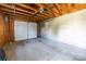 Empty garage with overhead door and concrete floor at 2008 Townsend Ave, Charlotte, NC 28205