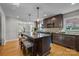 Updated kitchen featuring granite countertops and an island with seating at 2008 Townsend Ave, Charlotte, NC 28205