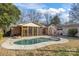 Inviting kidney-shaped pool with a fire pit at 2008 Townsend Ave, Charlotte, NC 28205