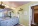 Elegant bathroom with double vanity, granite countertop, and walk-in shower at 3001 Burton Point Ct, Waxhaw, NC 28173