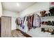 Large walk-in closet with ample shelving and hanging space at 3001 Burton Point Ct, Waxhaw, NC 28173