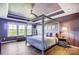 Main bedroom with canopy bed and ceiling fan at 3001 Burton Point Ct, Waxhaw, NC 28173