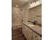 Bathroom boasts granite countertop, white cabinets, and a tub at 301 Cornelius Dr, Rock Hill, SC 29730