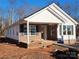 Brick and white sided house with covered porch at 301 Cornelius Dr, Rock Hill, SC 29730